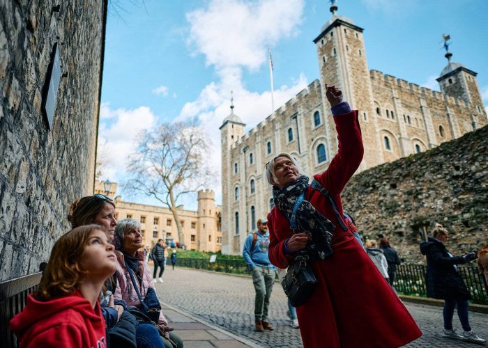 Tour guide explains the history of the tower of london
