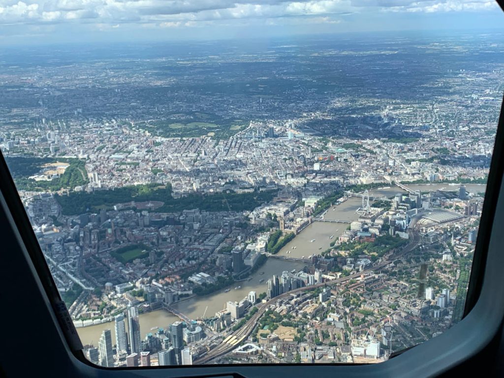 the view from an airline seat of central london